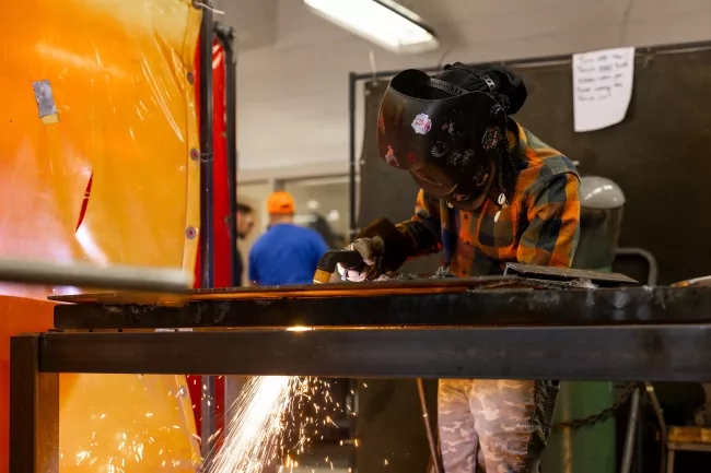 Male Welding Student