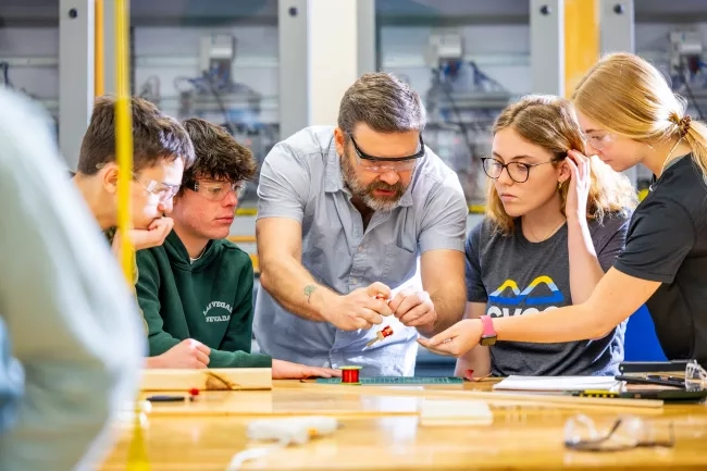 Mechatronics Instructor working with students